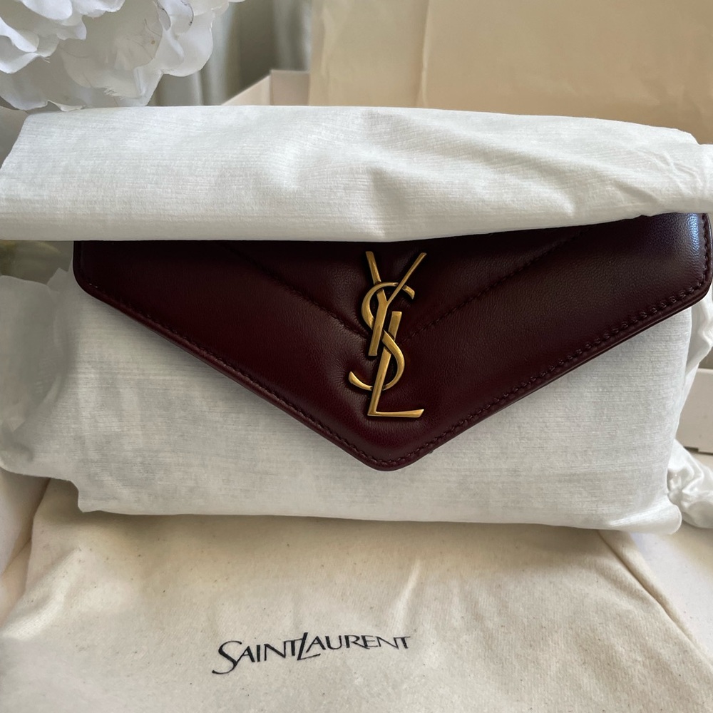 Saint Laurent burgundy bag  with Gold Logo